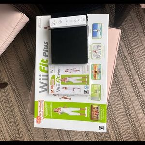 Wii console *1 remote* + Wii fit board + Wii fit plus